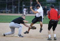 Beehmont Tavern’s Anthony DeGrazio leaps and tries to avoid the tag by Mansion-Broadway’s second baseman Kenneth Pasqualini but is called out on the play in the fourth inning. Photo by Albert Coqueran