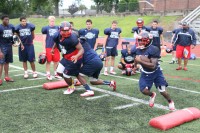 If opponents’ defenses are going to be successful against the 2013 Crusaders, they will have to stop speed demon junior halfback Malcolm Major (right), who in practice drills was running past his own Stepinac defenders. Photo by Albert Coqueran