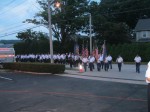 Local firefighters and veterans march in for the start of the 9/11 ceremony Wednesday night at the Hawthorne Fire House in Mount Pleasant.