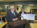 316 MP School Roundup pic | The Examiner News Charles Fasnacht III, president of the college and university division of Cenergistic, presented his company’s award to the Mount Pleasant School District.