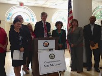 Interim Superintendent of White Plains Schools Tim Connors at the podium, Congresswoman Nita Lowey (right) and White Plains Youth Bureau Executive Director Frank Williams (far right) with other school district representatives from Westchester, Putnam and Rockland Counties met at School House in White Plains Monday to discuss the affects of federal cuts to quality education programs.