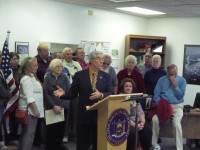 Steve Katz, with dozens of new retirees behind him, talks about new legislation he plans to bring forward in order to protect former employees.  David Propper Photo 