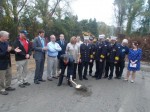 County Executive Rob Astorino, with shovel in hand, is joined by Millwood Fire District Commissioner Hala Makowska and Fire Chief Greg Santone and surrounded by a large gathering of community members, volunteers and officials during groundbreaking Sunday for the new Millwood firehouse.