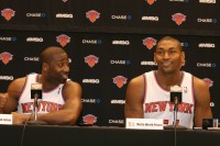 With 5.8 assists per game last season, guard Raymond Felton (left) surely welcomes the addition of Metta World Peace (right) to the Knicks. World Peace can shoot from the outside; snatch rebounds and knows how to get in position for the dish-off when Felton is penetrating to the hoop.  Photo by Albert Coqueran      