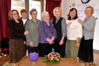 Kaufman (center) and colleagues are all smiles last Thursday inside the Mahopac public Library. Jim Sparks Photo