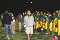 Kevin Bullock walks the sideline, as Ramapo readies to play the Tigers in the Section 1 AA Quarterfinals at White Plains High School. Bullock, the Gryphons Defensive Coordinator assumed the Head Coaching duties, after former Head Coach Duff Pannell was accused of assaulting a player and relieved of his position. Photo by Albert Coqueran