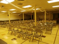 OLYMPUS DIGITAL CAMERA | The Examiner News Less than an hour earlier, the basement of Our Lady of Loretta Church was packed with many people standing to watch the live feed of the ceremony going on upstairs.