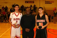 SPORTS-2 | The Examiner News Mamaroneck High School beat Sleepy Hollow High School, 48-37, in the finale of the Harry Jefferson Showcase, at White Plains High School, on Sunday, Dec. 15. Tournament namesake Harry Jefferson (center) presented Horsemen guard Nick Arduino (left) with the Sportsmanship Award of the Game and Tigers Dean DeLucia (right) with the Most Valuable Player of the Game Award.