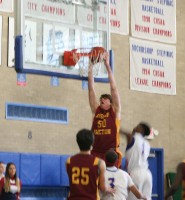 Bishop Ireton center David Senft slams in two points during the Stepinac versus Ireton game. But the Army bound 6’ 9” center could only manage four points against the Crusaders on Sunday, in the Cardinals 74-70 OT victory. 
