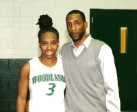 Sports-1 | The Examiner News Woodlands High School senior guard Imani Tilford (left) was announced as a nominee for the 2014 McDonaldâs All American Team. Tilford, pictured with her uncle and Head Woodlands Girls Basketball Coach Ty Postell, will be playing for Georgia Tech University next season. Photo by Albert Coqueran