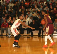 Tigers’ forward Marshon Morris (left) defends Knights’ guard Akeem Krubally in the third quarter of the Mt. Vernon vs. White Plains game. Krubally scored eight points including three of four from the free throw line, as the Tigers loss to the Knights, 47-39, on Wednesday, January 8. Photo by Albert Coqueran