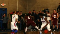 Crusaders guards Kylan Guerra (left) and Walter King (right) execute the defensive trap play successfully on Gaels guard Giovanni Gabbidon and steal the ball in the fourth quarter, as Stepinac defeated Iona Prep, 57-45, on Friday, January 25. Photo by Albert Coqueran