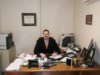 Michael Bartolotti sits in his office inside the county office building. He announced his candidacy for Putnam County Clerk last week. 