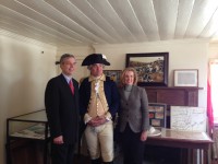 White Plains Mayor Tom Roach, an actor playing the role of General George Washington, and Councilwoman Beth Smayda at the Jacob Purdy House. Howard Waldman Photos