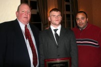 [L-r] Stepinac Head Football Coach Mike O’Donnell, Golden Dozen Award recipient lineman Brain Harris and Assistant Coach Andy Martinez, at the Golden Dozen Awards ceremony, at the Westchester Country Club. Photo Courtesy of Stepinac Athletics