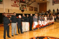 The Tigers honor the playing of the National Anthem prior to the start of the Section 1 Quarterfinal game at White Plains High School. However, there will be no National Anthem for the White Plains (16-4) at the County Center this year, as their outstanding basketball season comes to an end with a 69-66 loss to Spring Valley. 