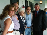 First county executive David Bruen (centered) poses from left to right current county executive MaryEllen Odell, Personnel Director Paul Eldridge, Philanthropist George Whipple, and Sheriff Don Smith. 