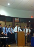 Members of the Horace Greeley High School varsity wrestling team appeal to administrators and the Board of Education to save the job of their coach and Seven Bridges Middle School technology teacher Mike DiBellis, who may lose his position due to budget cuts.