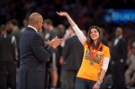 Westlake Middle School special education teacher Virginia Campbell is applauded by former New York Knick star John Starks on Apr. 2 at Madison Square Garden. Campbell was honored for her work with students with autism.