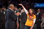 344 MP Teacher Honored pic | The Examiner News Westlake Middle School special education teacher Virginia Campbell is applauded by former New York Knick star John Starks on Apr. 2 at Madison Square Garden. Campbell was honored for her work with students with autism.