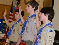 From left to right, Brian LaPlaca, Theodore Chomiak and Scott Tung Louis achieve the rank of Eagle.