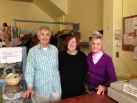 (L to r) Rene Thiel of Hitchcock Presbyterian Church, Scarsdale, Judy Korman of White Plains Woman’s Club and Barbara Underhill of Scarsdale Woman’s Club volunteering at The Thrift Shop in White Plains on a busy Saturday morning.