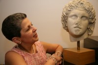 Georgette Gouveia with a bust of Alexander the Great. Photograph by Bob Rozycki. Courtesy of WAG magazine.