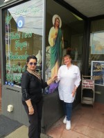 Julie Reed, left, who owns The Art of Astrology, and Diane LaVita outside the store at 242 Harrison Ave. Jon Craig Photo