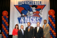 The NY Knicks D-League Team that will play at the Westchester County Center beginning in November 2014, will forever be known as The Westchester Knicks. [L-r] Westchester Parks Commissioner Kathleen O’Connor, Westchester County Executive Robert Astorino, Dave Howard, the President of MSG Sports, Bill Boyce, V.P. Sales & Business Operations and Knicks forward Jeremy Tyler, unveiled the name and logo at the Westchester County Center, on May 14. Albert Coqueran Photo