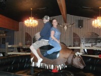 Photo caption: Co-owners Rick Cipriani and Wendy Wulkan are on top of the bull inside their new brewpub, a perfect example of the western theme they are shooting for. DAVID PROPPER PHOTO 