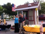 Michael Baker celebrates the opening of The Entrepreneur's Shack last Saturday with a champagne toast.