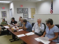 The Southeast Town Board and the Brewster Village Board of Trustees held a combined public hearing on June 18 in village hall on a proposal for a four-story office building.