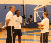 NY Liberty Head Coach Bill Laimbeer (right) gathers his team in a huddle, during practice at the MSG Training Center, as he seeks remedies to his team’s slow start this season with a 5-11 record. 