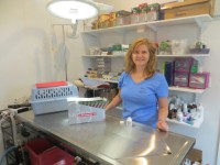 Pet rescue Board member Barbara Gebala of Mamaroneck in Pet Rescue's new clinic.