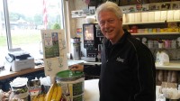 Former president Bill Clinton makes a donation to the Wounded Warrior Project at Lange’s Little Store in Chappaqua.