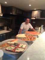 Leo Hajdari mans the Pizza Bar at Trattoria 632, Purchase. 