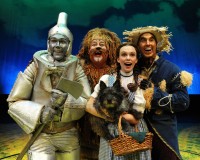The Oz quartet of with Chris Kind as the Tin Man, Jayson Elliott as the Cowardly Lion, Devon Perry as Dorothy, and Tim Dolan as the Scarecrow.