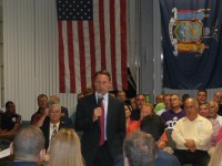  Westchester County Executive Rob Astorino, who is running for governor speaks with a large crowd of people in Carmel last week. The Republican is challenging Andrew Cuomo.