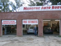Under a new ownership sign, Jerry Cosenza stands outside of Mahopac Auto Body. The cleaned up location has caught the eye of Mahopac residents, and Cosenza’s quality work is drawing new customers every day.