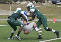 DaShawn Beecham (L) and Nahjee O'Donohue (R) sack Haldane QB Tyler Giachinta in the end zone Saturday, forcing a fumble, recovered by O'Donohue for a TD.