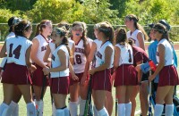 The Harrison field hockey team talks strategy during a timeout during a loss to Byram Hills last week.