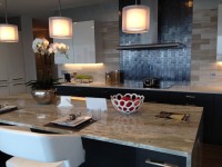 Ritz-2 | The Examiner News The eat-in kitchen includes first-class appliances and quality countertops.
