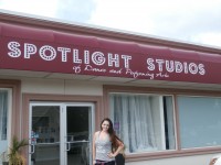 Kristi Tumminia stands in front her business, Spotlight Studios, along Route 6. The 23-year-old has been opened since June. DAVID PROPPER PHOTO 