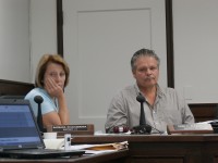 Chairman Carl Albano and Legislator Barbara Scuccimarra both sit at a Physical Services Committee meeting where the start time of a joint meeting between the legislature and the Philipstown and Cold Spring Boards was argued for 20 minutes. 