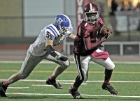 Kevin Williams | The Examiner News Valhalla's Kevin Williams tries to outrun the Haldane defense in Friday's game.