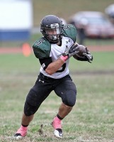 NickSantavicca | The Examiner News Yorktown's Nick Santavicca chugs for some of his 328 rushing yards in 32-21 win over Greeley.