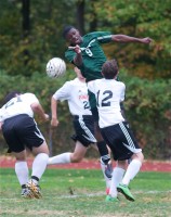 Weston Maxwell (9) of Woodlands goes up for a ball last week at Croton.