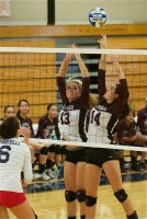 dominique loguidice | The Examiner News Dominigue Loguidice (13) and Jade Pineda (14) of Harrison set up at the net.