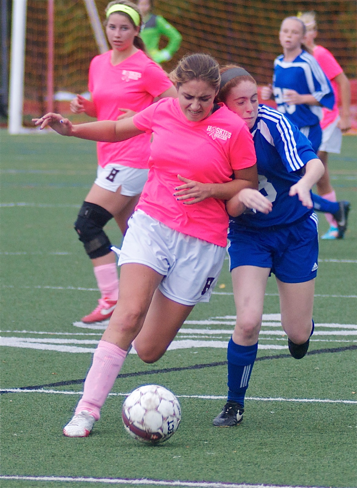 Jessica Scazzero of Harrison (L) uses her body to block out Pearl River defender.