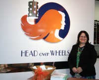 Dominique Simons, owner of Head Over Wheels Salon in Millwood. Colette Connolly photo 
